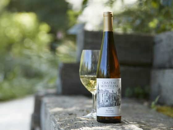 Potter Valley Riesling and wine glass on wooden bench